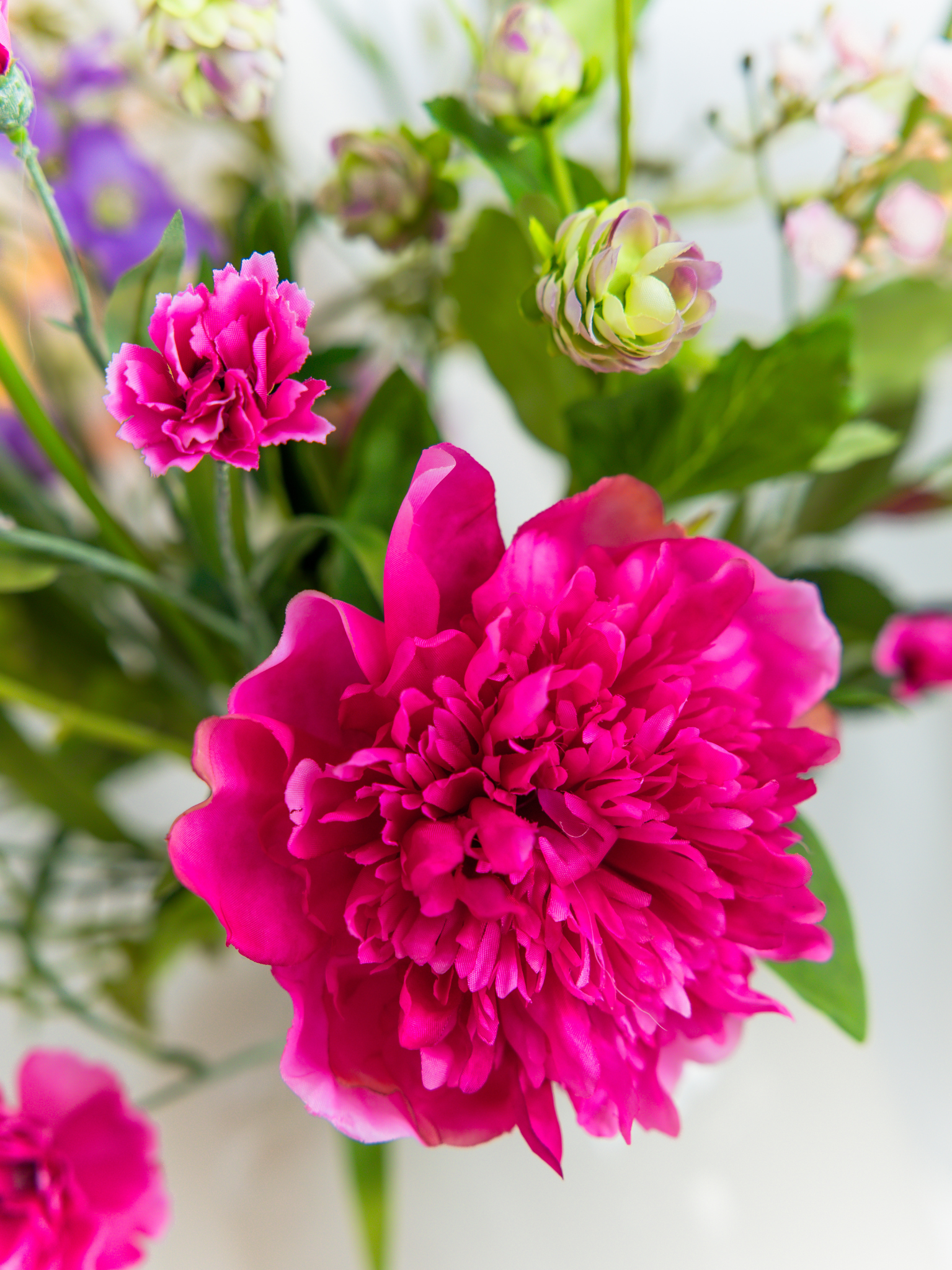 Fuschia trosanjer zijden bloem