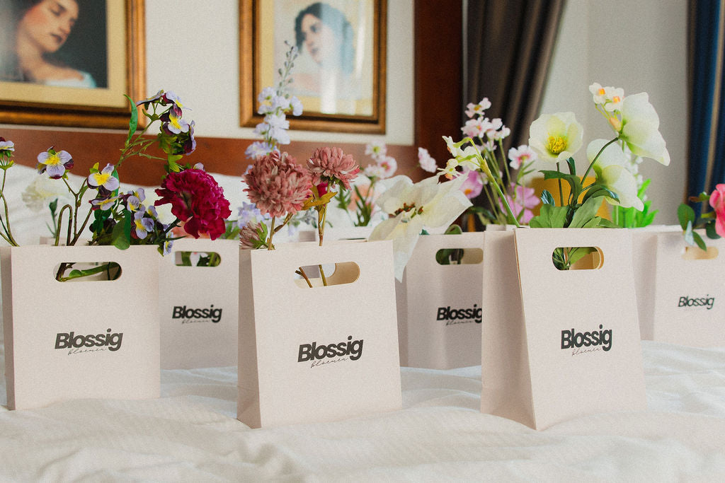 Geboortebloemen in blossig tasjes